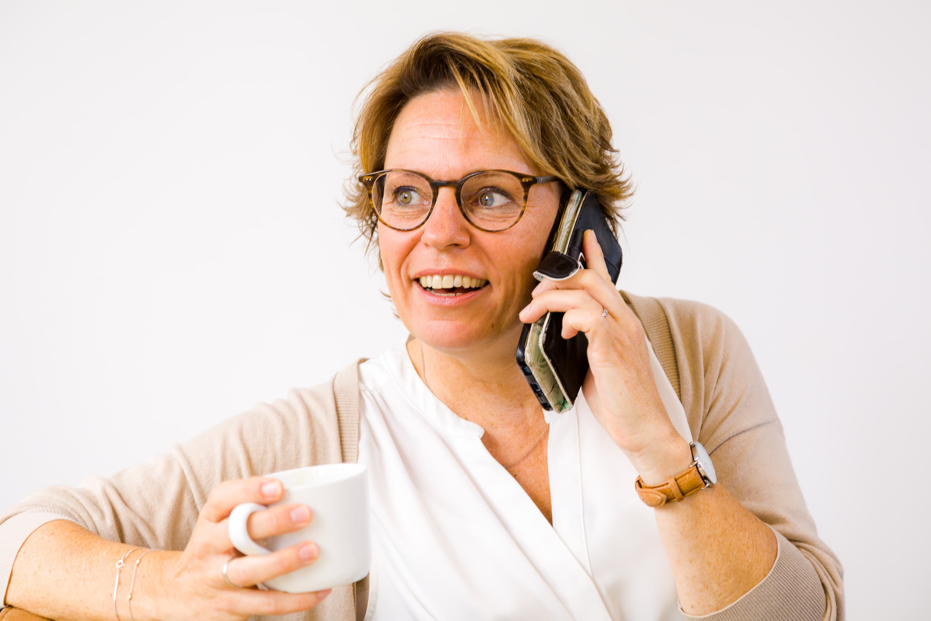 Personal Branding foto’s van Carina de Wilde of Carina met een cliënt die coaching ontvangt. De beelden stralen vertrouwen, energie en groei uit.